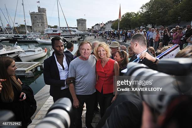 French actress Alexandra Lamy poses with producer Quentin Raspail during the 17th Festival of TV fiction in La Rochelle on September 11, 2015. AFP...