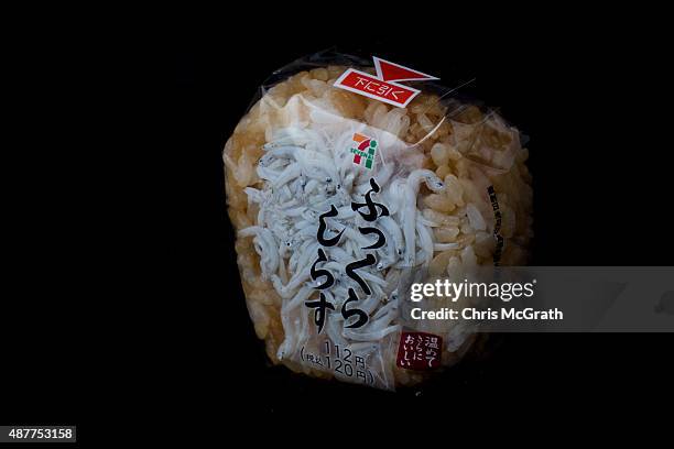 Rice ball or "onigiri" containing whitebait from a convenience store or "konbini" is pictured on September 10, 2015 in Tokyo, Japan. Japan's Konbini...