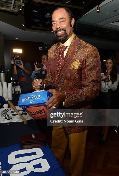 Basketball player Walt Frazier attends the annual Charity Day hosted by Cantor Fitzgerald and BGC at Cantor Fitzgerald on September 11, 2015 in New...