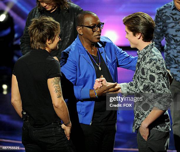 Judge Keith Urban, mentor Randy Jackson and eliminated contestant Sam Woolf onstage at FOX's "American Idol XIII" Top 5 to 4 Live Elimination Show on...