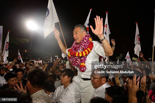 Prime Minister and People's Action Party Secretary General, Lee Hsien Loong celebrates after winning his seat for Ang Mo Kio Group Representation...