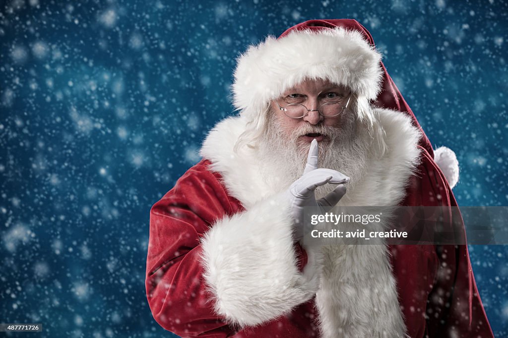 Real Santa With Finger to Lips