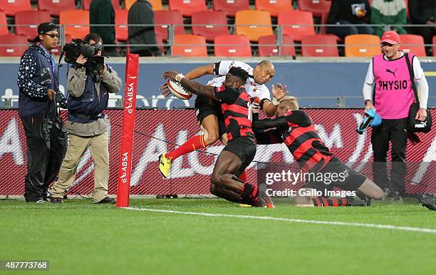 Luther Obi of Eastern Province Kings forces Cornal Hendricks of Toyota Free State out of bounds during the Absa Currie Cup match between EP Kings and...