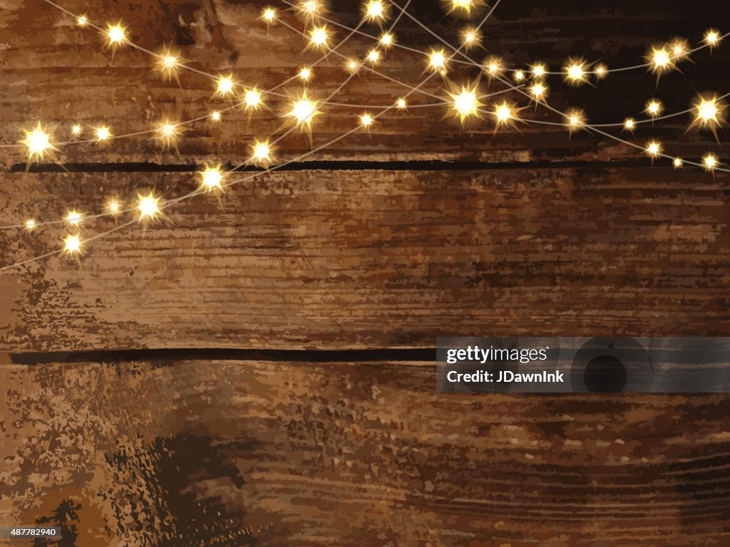 Horizontal wooden background with string lights and jars