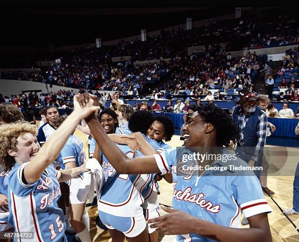 Final Four: Louisiana Tech players Jennifer White and Debra Rodman victorious on court after winning game vs Cheyney State at the Norfolk...