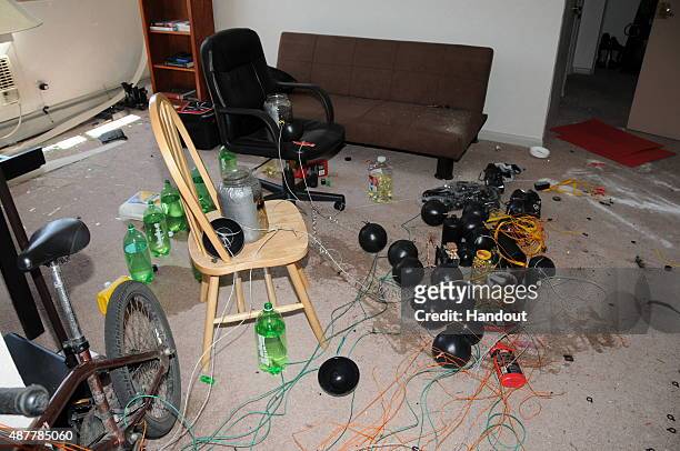 In this handout photo provided by the Arapahoe County District Attorney’s Office, homemade explosives are arranged in James Holmes' apartment circa...