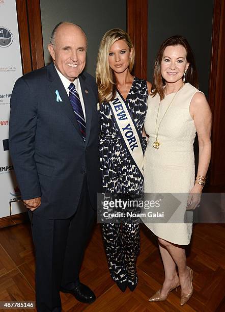 Former Mayor of New York City Rudy Giuliani, Miss NY USA 2015 Nicole Kulovany and Judith Giuliani attend the annual Charity Day hosted by Cantor...