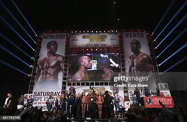 Boxers Floyd Mayweather Jr. And Andre Berto face off during their official weigh-in at MGM Grand Garden Arena on September 11, 2015 in Las Vegas,...