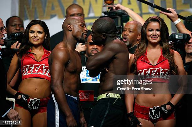 Boxers Floyd Mayweather Jr. And Andre Berto face off during their official weigh-in at MGM Grand Garden Arena on September 11, 2015 in Las Vegas,...