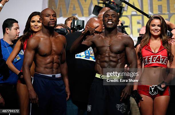 Boxers Floyd Mayweather Jr. And Andre Berto face off during their official weigh-in at MGM Grand Garden Arena on September 11, 2015 in Las Vegas,...