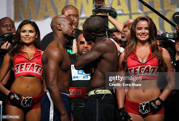 Boxers Floyd Mayweather Jr. And Andre Berto face off during their official weigh-in at MGM Grand Garden Arena on September 11, 2015 in Las Vegas,...