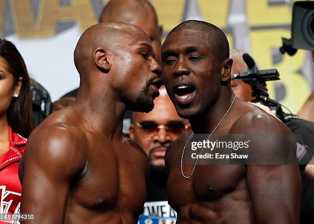 Boxers Floyd Mayweather Jr. And Andre Berto face off during their official weigh-in at MGM Grand Garden Arena on September 11, 2015 in Las Vegas,...