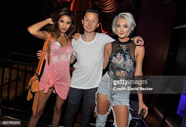 Model Ashley Sky, DJ Martin Solveig and Amanda Del Duca appears during the "Encore Beach Club at Night" launch at the Encore Beach Club at Wynn Las...