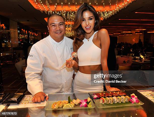 Chef Joseph Elevado and model Ashley Sky appear at Andrea's at Encore Las Vegas on May 1, 2014 in Las Vegas, Nevada.
