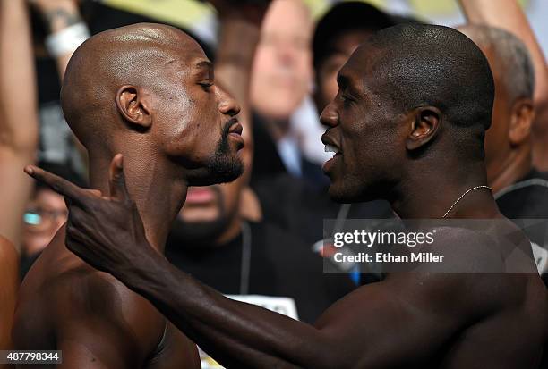 Boxers Floyd Mayweather Jr. And Andre Berto face off during their official weigh-in at MGM Grand Garden Arena on September 11, 2015 in Las Vegas,...