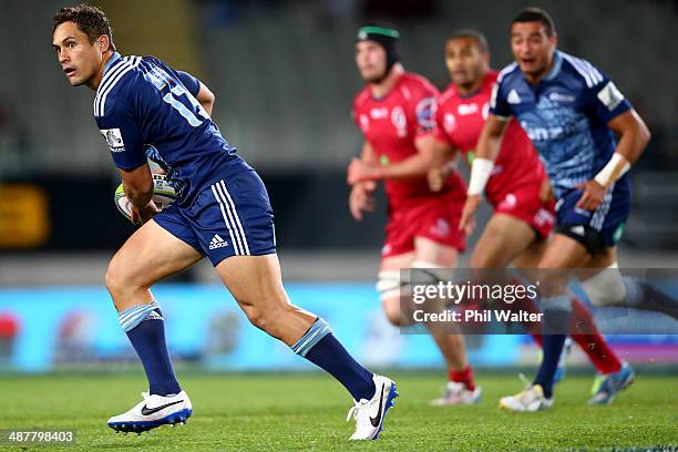 Jackson Willison of the Blues runs the ball during the round 12 Super Rugby match between the Blues and the Reds at Eden Park on May 2, 2014 in...