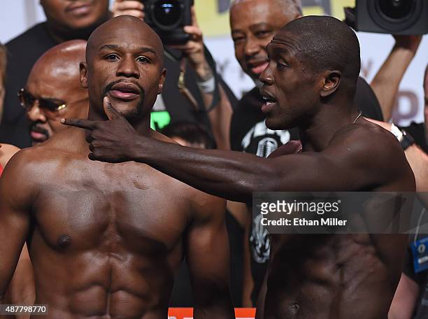 Boxers Floyd Mayweather Jr. And Andre Berto pose during their official weigh-in at MGM Grand Garden Arena on September 11, 2015 in Las Vegas, Nevada....