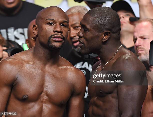 Boxers Floyd Mayweather Jr. And Andre Berto pose during their official weigh-in at MGM Grand Garden Arena on September 11, 2015 in Las Vegas, Nevada....