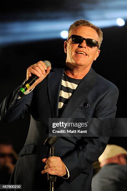 Graham McPherson aka 'Suggs' performs with Madness at The Spitfire Ground on September 11, 2015 in Canterbury, England.