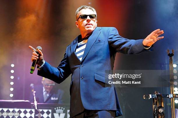 Graham McPherson aka 'Suggs' performs on stage with Madness at The Spitfire Ground on September 11, 2015 in Canterbury, England.