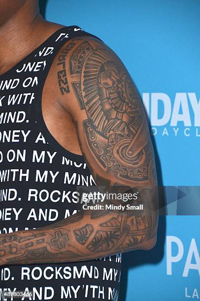 Actor/TV personality Nick Cannon, tattoo detail, attends Ditch Fridays at Palms Pool & Dayclub on September 11, 2015 in Las Vegas, Nevada.