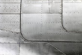 Aircraft siding with rivets