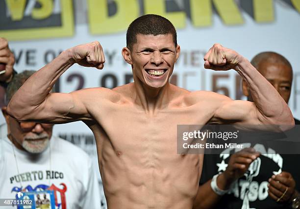 Boxer Roman Martinez poses on the scale during his official weigh-in at MGM Grand Garden Arena on September 11, 2015 in Las Vegas, Nevada. Martinez...