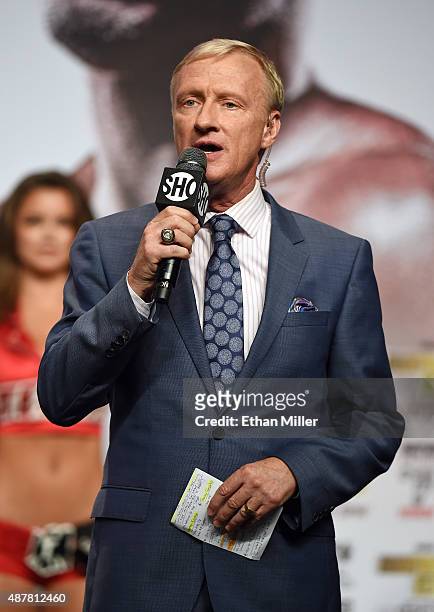 Boxing announcer Jimmy Lennon Jr. Speaks during the official weigh-in for the Floyd Mayweather Jr. And Andre Berto bout at MGM Grand Garden Arena on...