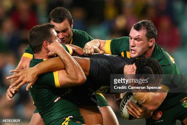 Martin Taupau of the Kiwis is tackled during the ANZAC Test match between the Australian Kangaroos and the New Zealand Kiwis at Allianz Stadium on...