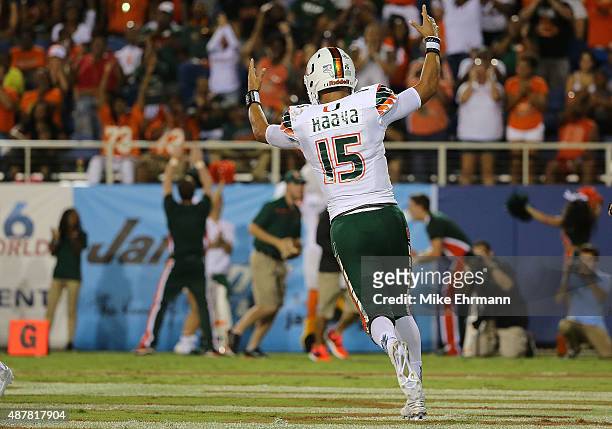 Brad Kaaya of the Miami Hurricanes celebrates a touchdown during a game against the Florida Atlantic Owls at FAU Stadium on September 11, 2015 in...