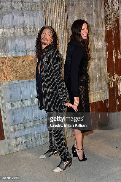 Steven Tyler and Liv Tyler attend the Givenchy show during Spring 2016 New York Fashion Week at Pier 26 on September 11, 2015 in New York City.