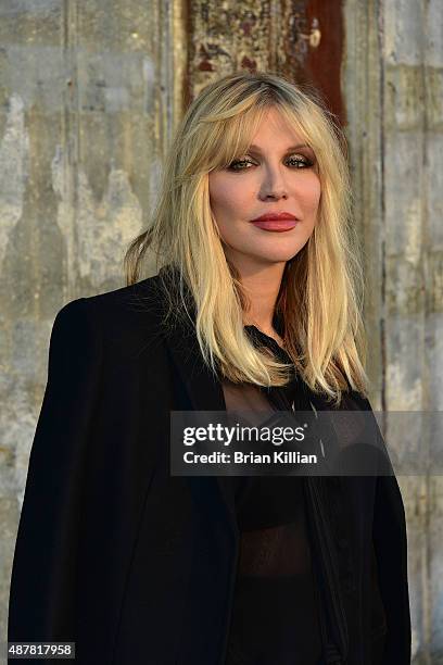 Courtney Love attends the Givenchy show during Spring 2016 New York Fashion Week at Pier 26 on September 11, 2015 in New York City.