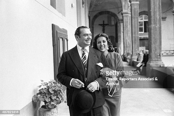 American actor Ernest Borgnine and Greek-born Italian actress Yvonne Sanson smiling during a break on the set of the film The King of Poggioreale....