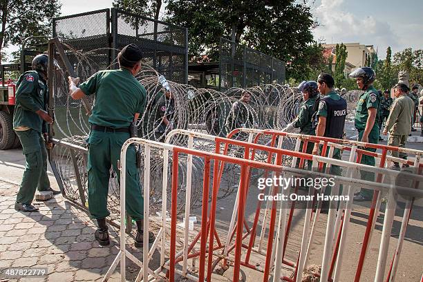 Police forces seal off Freedom Park with barbed wire barricades ahead of a planned rally by the opposition Cambodian National Rescue Party on the...