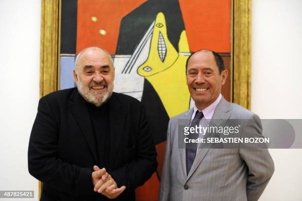 Spanish artist Pablo Picasso's heir Claude Picasso , and Alexander Klee heir of the Swiss-German painter Paul Klee, pose in front of a Picasso canvas...