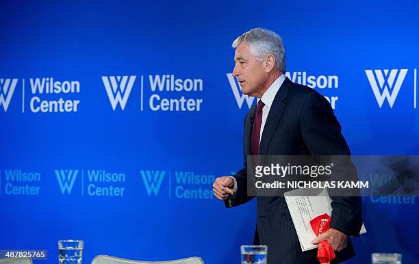 Defense Secretary Chuck Hagel leaves after addressing the Woodrow Wilson Center in Washington,DC on May 2, 2014 to mark the 20th anniversary of the...