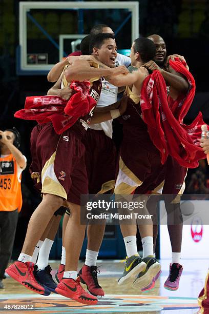 Players of Venezuela celebrate after winning a semifinals match between Canada and Venezuela as part of the 2015 FIBA Americas Championship for Men...