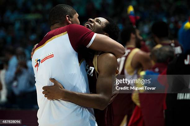 Players of Venezuela celebrate after winning a semifinals match between Canada and Venezuela as part of the 2015 FIBA Americas Championship for Men...