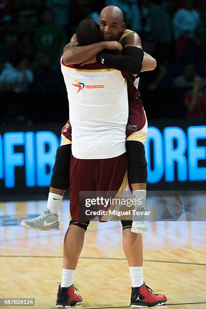 Players of Venezuela celebrate after winning a semifinals match between Canada and Venezuela as part of the 2015 FIBA Americas Championship for Men...