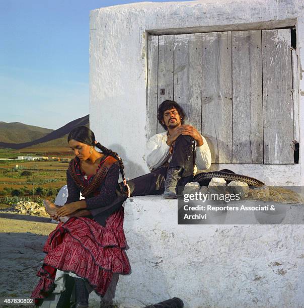 Cuban-American actor Tomas Milian and Spanish actressPaloma Cela Molinero in a scene of Tepepa. 1968