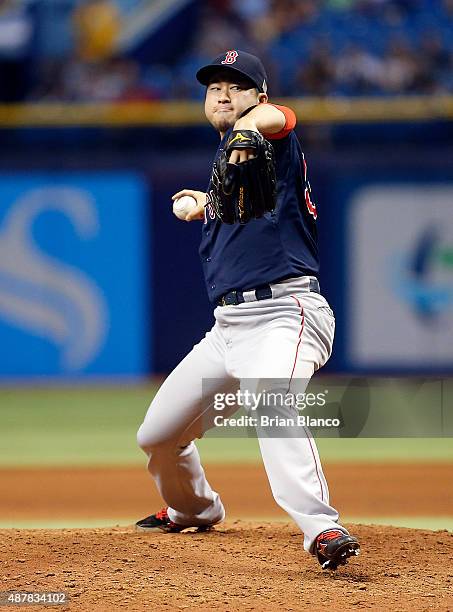 Junichi Tazawa of the Boston Red Sox pitches during the eighth inning of a game against the Tampa Bay Rays on September 11, 2015 at Tropicana Field...
