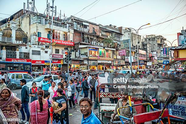 busy streets of the old delhi spice market - chandni chowk stock pictures, royalty-free photos & images