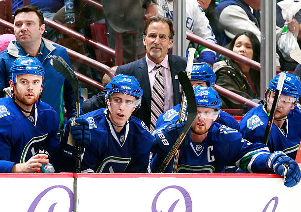 head-coach-john-tortorella-of-the-vancouver-canucks-looks-on-from-the-bench-during-their-nhl.jpg