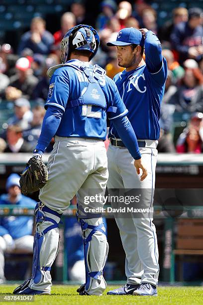 Catcher Brett Hayes of the Kansas City Royals talks with pitcher Bruce Chen during the fifth inning of their game against the Cleveland Indians on...