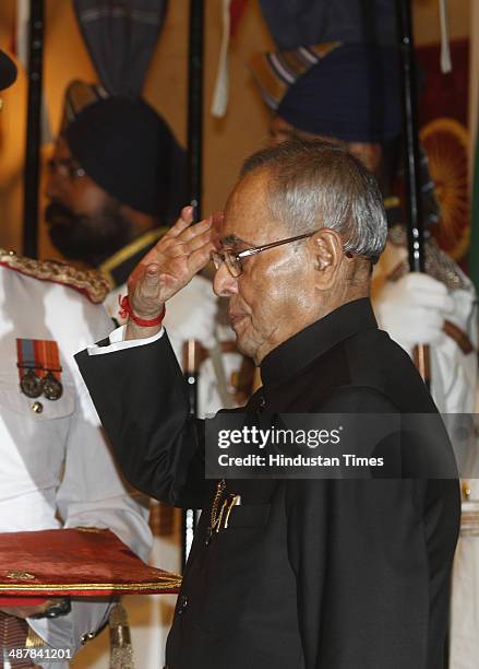 President Pranab Mukherjee salute during a Defence Investiture Ceremony at Rashtrapati Bhawan, on May 2, 2014 in New Delhi, India. COBRA commando...