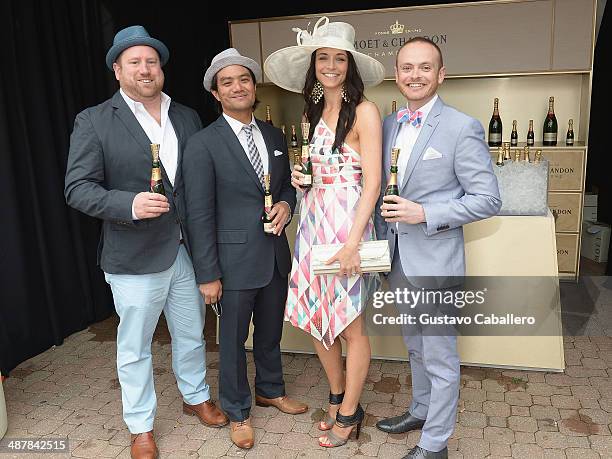 Guests toast the 140th Kentucky Derby with Moët & Chandon at Churchill Downs on May 2, 2013 in Louisville, Kentucky.