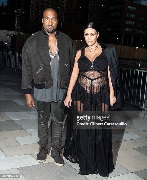 Kanye West and Kim Kardashian West are seen arriving at the Givenchy fashion show during Spring 2016 New York Fashion Week on September 11, 2015 in...