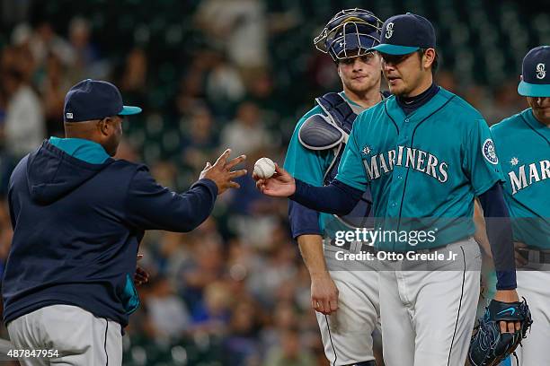 Starting pitcher Hisashi Iwakuma of the Seattle Mariners is removed from the game by manager Lloyd McClendon in the seventh inning against the...