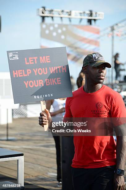 Volunteer is seen during the Cycle for Heroes event to benefit The Heroes Project at Santa Monica Pier on September 11, 2015 in Santa Monica,...