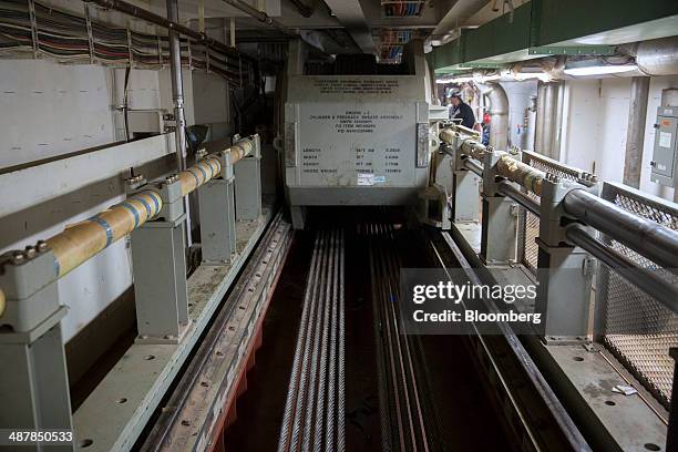 An aircraft elevator hoist machine is seen inside the USS Gerald R. Ford aircraft carrier during outfitting and testing at Huntington Ingalls...